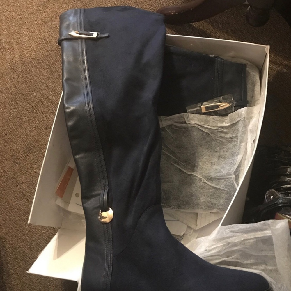 Woman’s tall boots navy blue with gold buckles